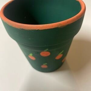 Green and Orange Painted Pot